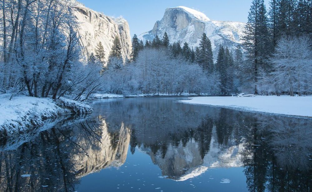 haft dome reflection in yosemite national park winter